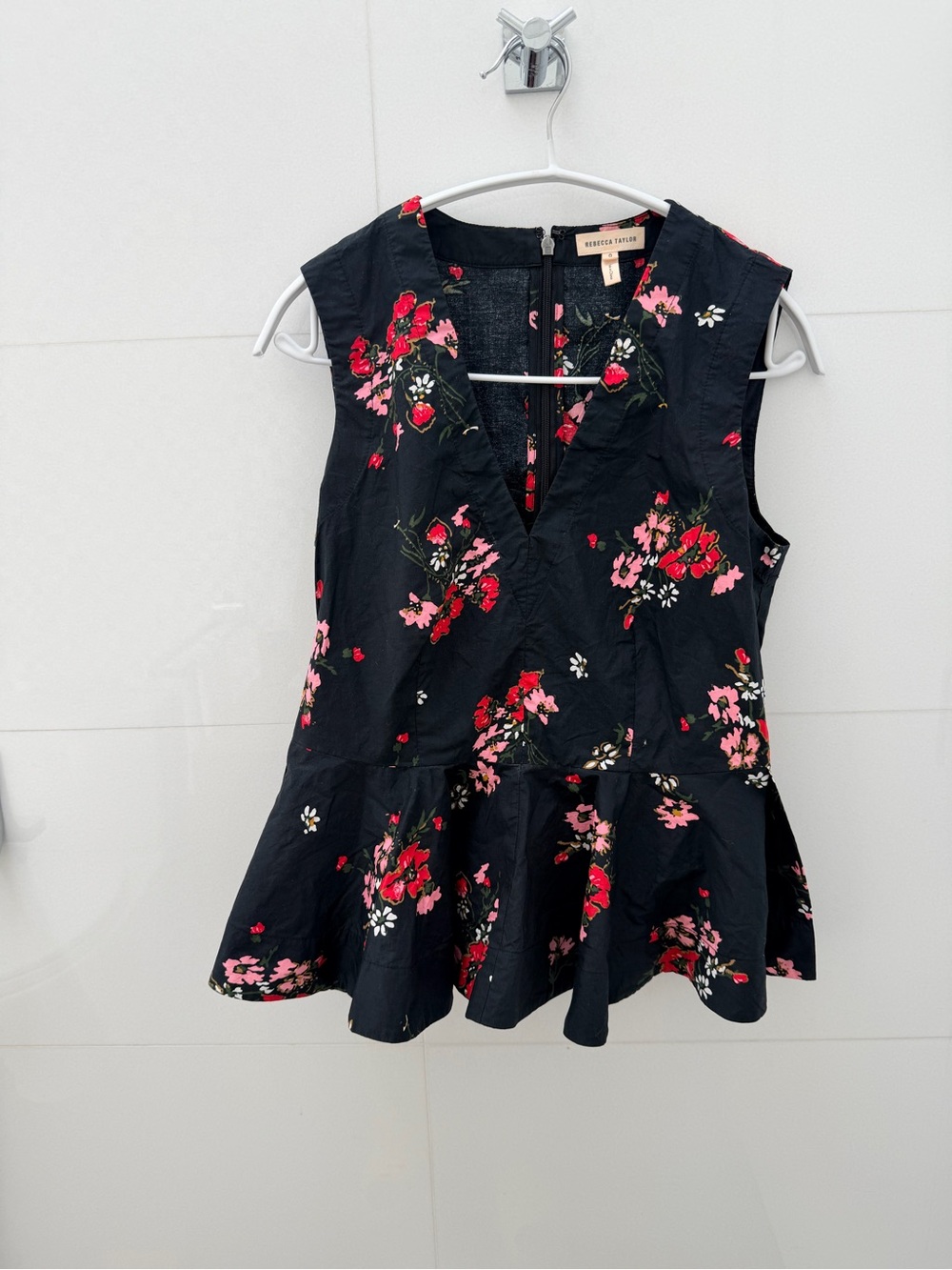 Flutter Peplum Floral Top in Black with Pink & Red Blooms